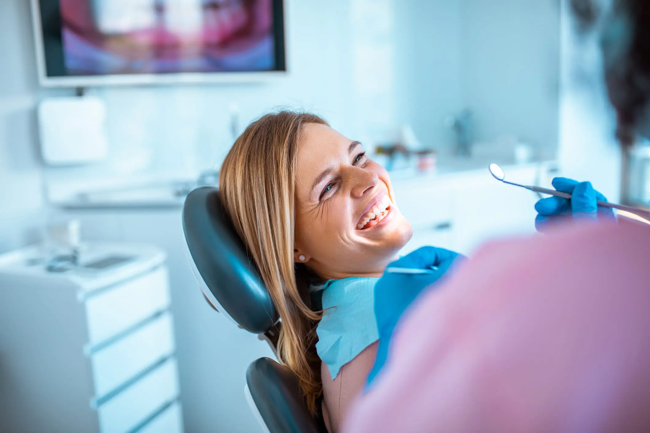 patient receiving a dental exam 